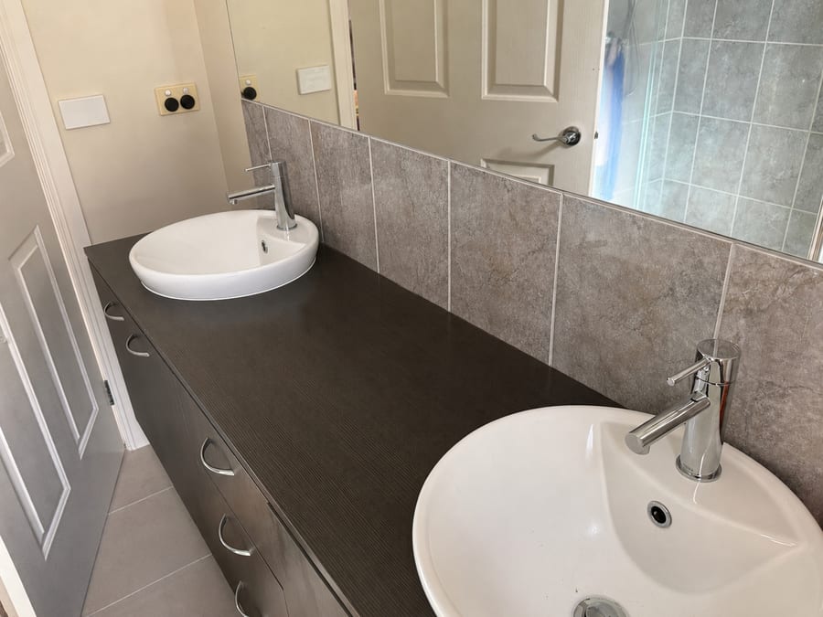 New basins and tapware installed during a bathroom renovation