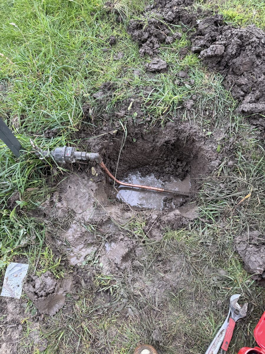 Emergency repair of a burst water pipe at a Sunbury home