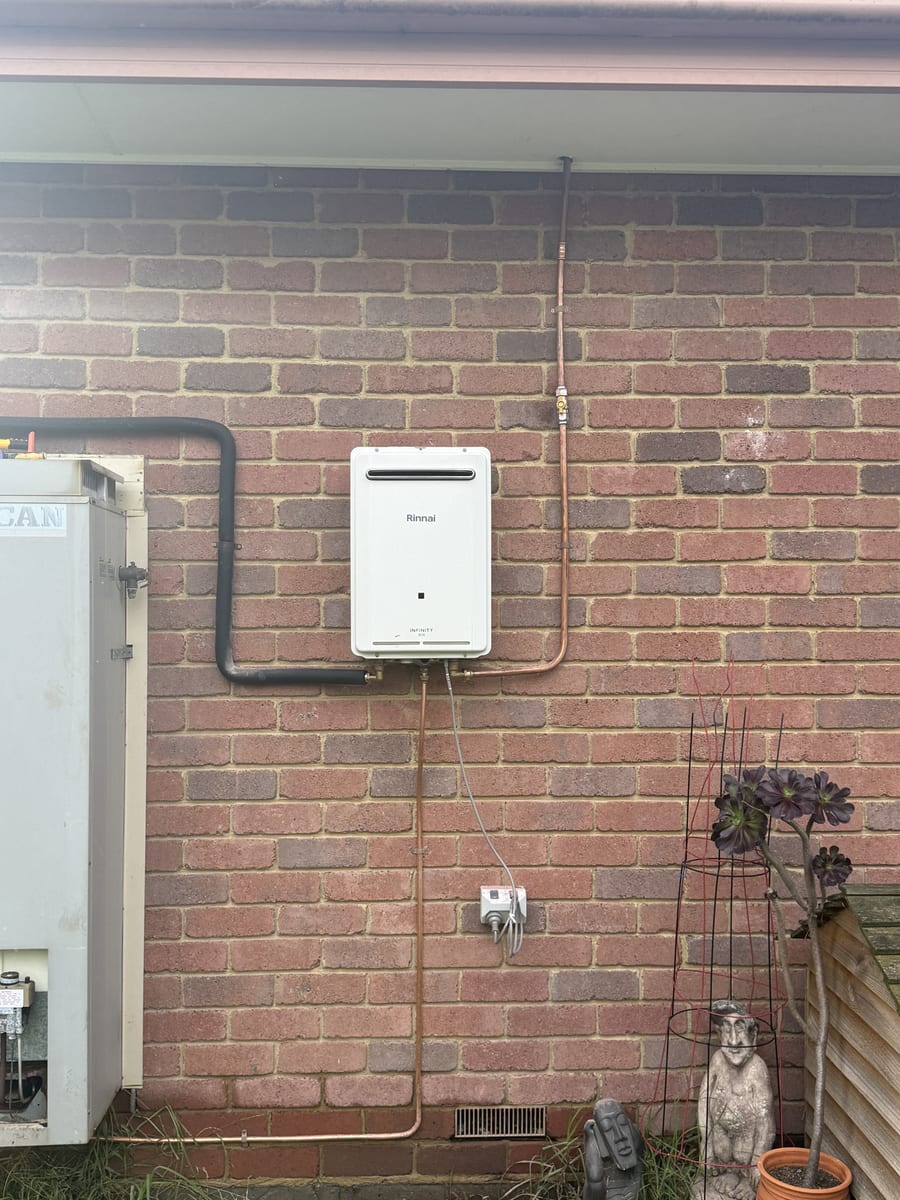 Old storage unit replaced with a new continuous flow hot water system